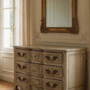 Curved antique commode in pistachio green patina.