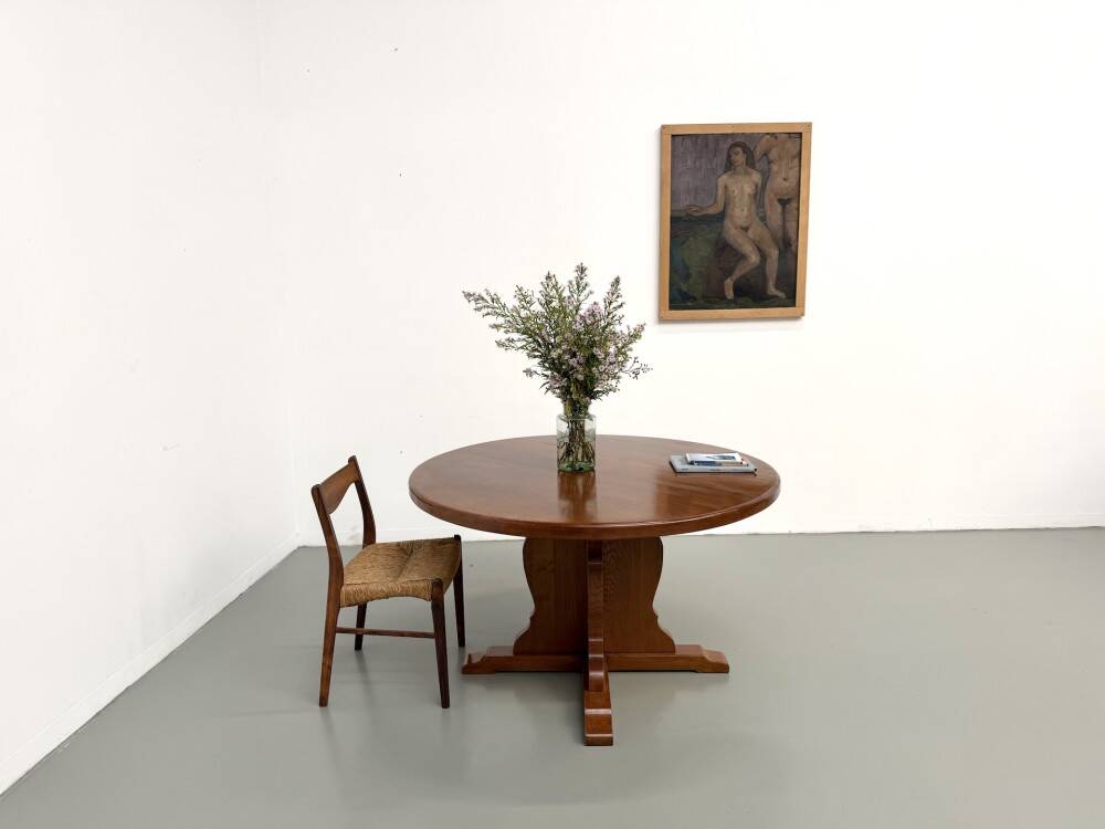 Brutalist round table in solid oak, 1960s.