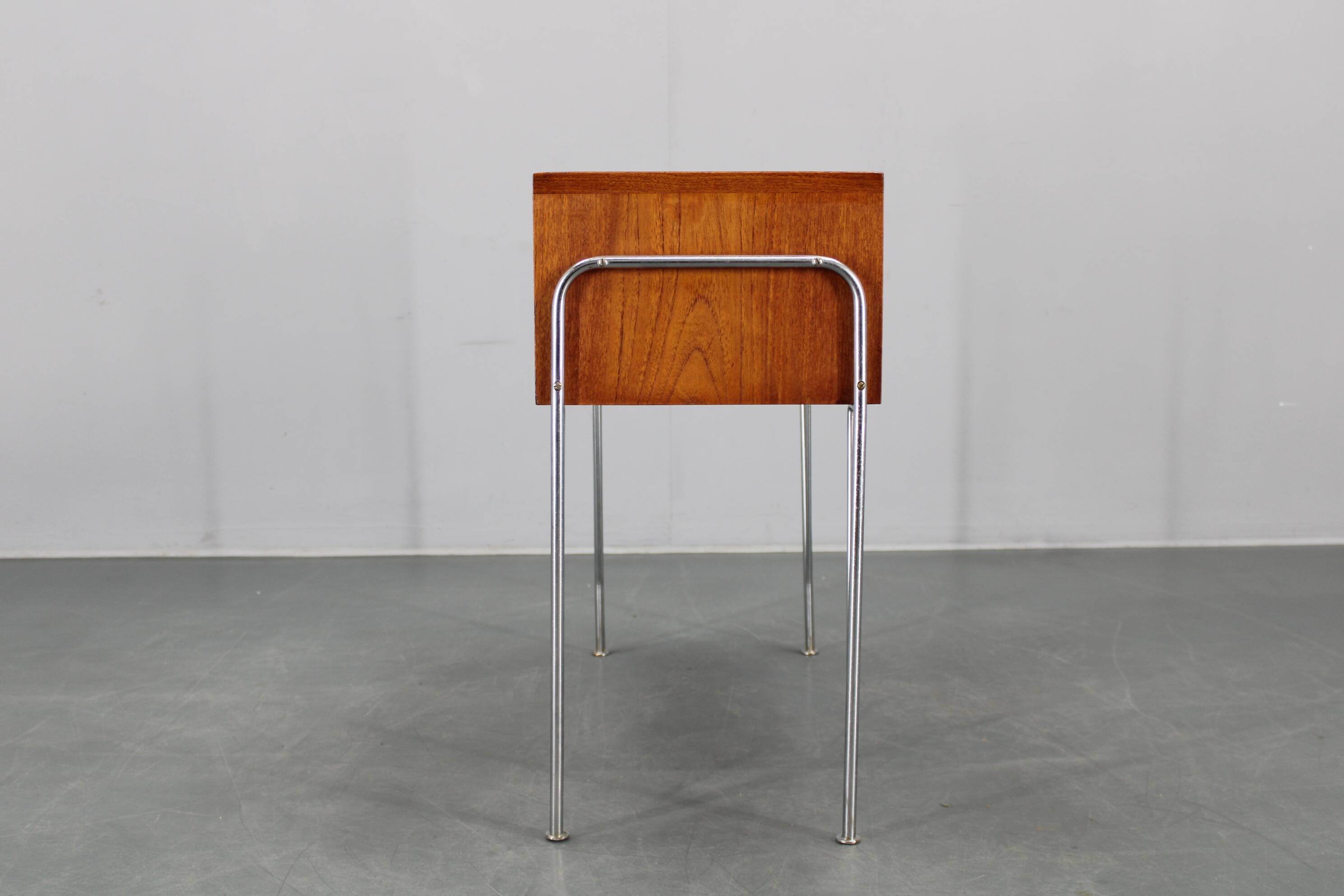 1960s Danish teak shelf cabinet with chrome plated legs