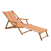Vintage striped multicoloured deck chair with original patina.