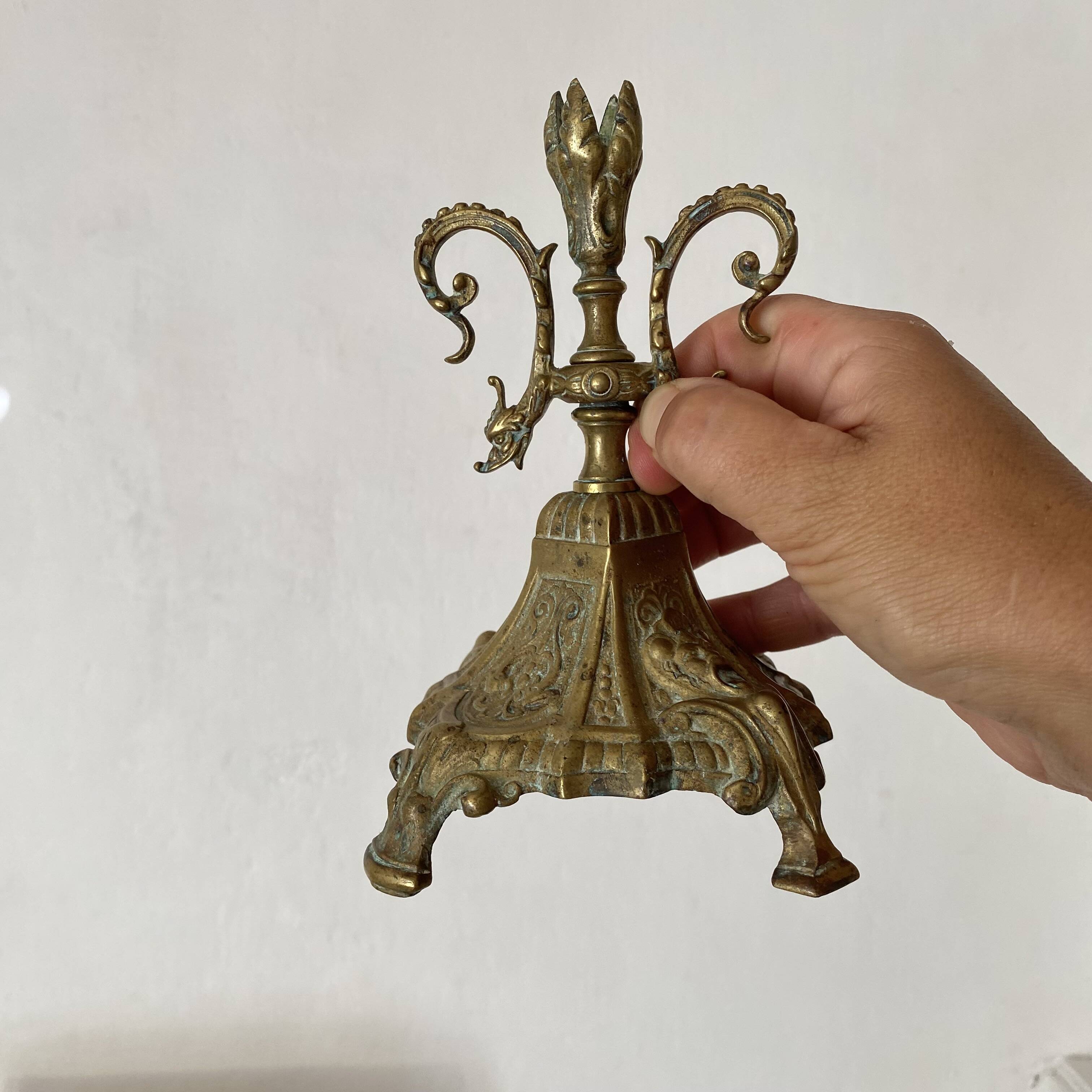 Pair of antique bronze candlesticks