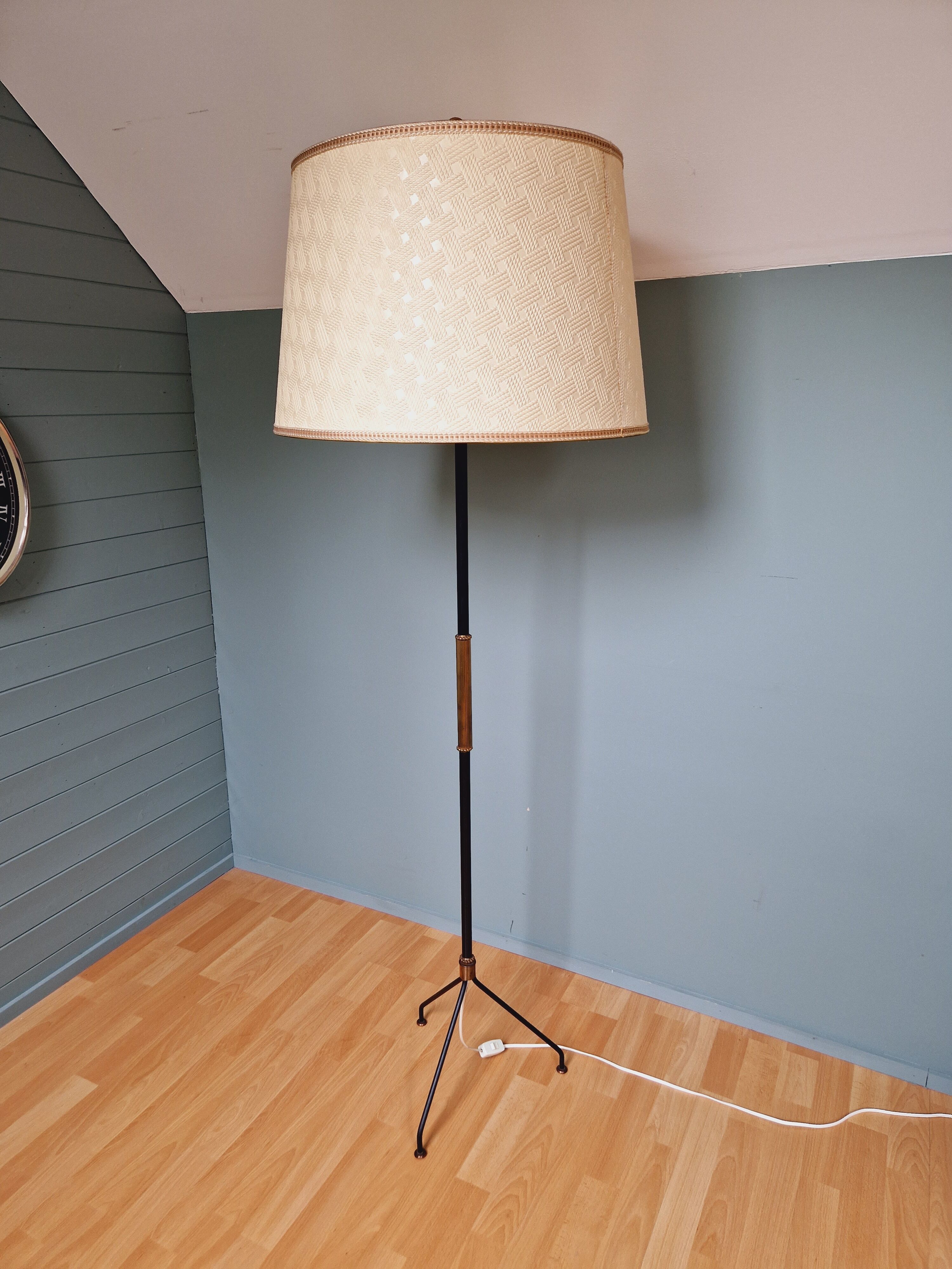 Vintage tripod floor lamp in black lacquered metal and brass, 50s