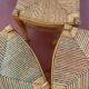 Trio of vintage straw/colored chairs