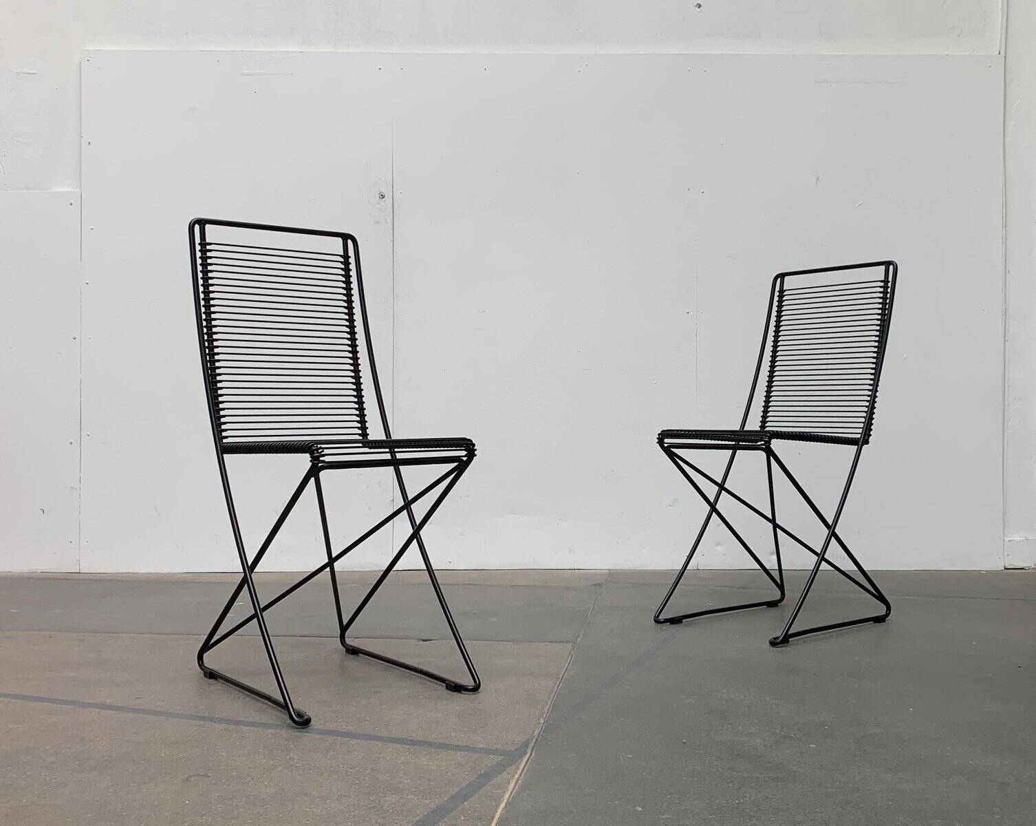 Set of black postmodern Kreuzschwinger chairs by Till Behrens for Schlubach, 1980s.