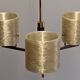 Three-light chandelier in mother-of-pearl and brass, Maison Arlus, France, circa 1950.