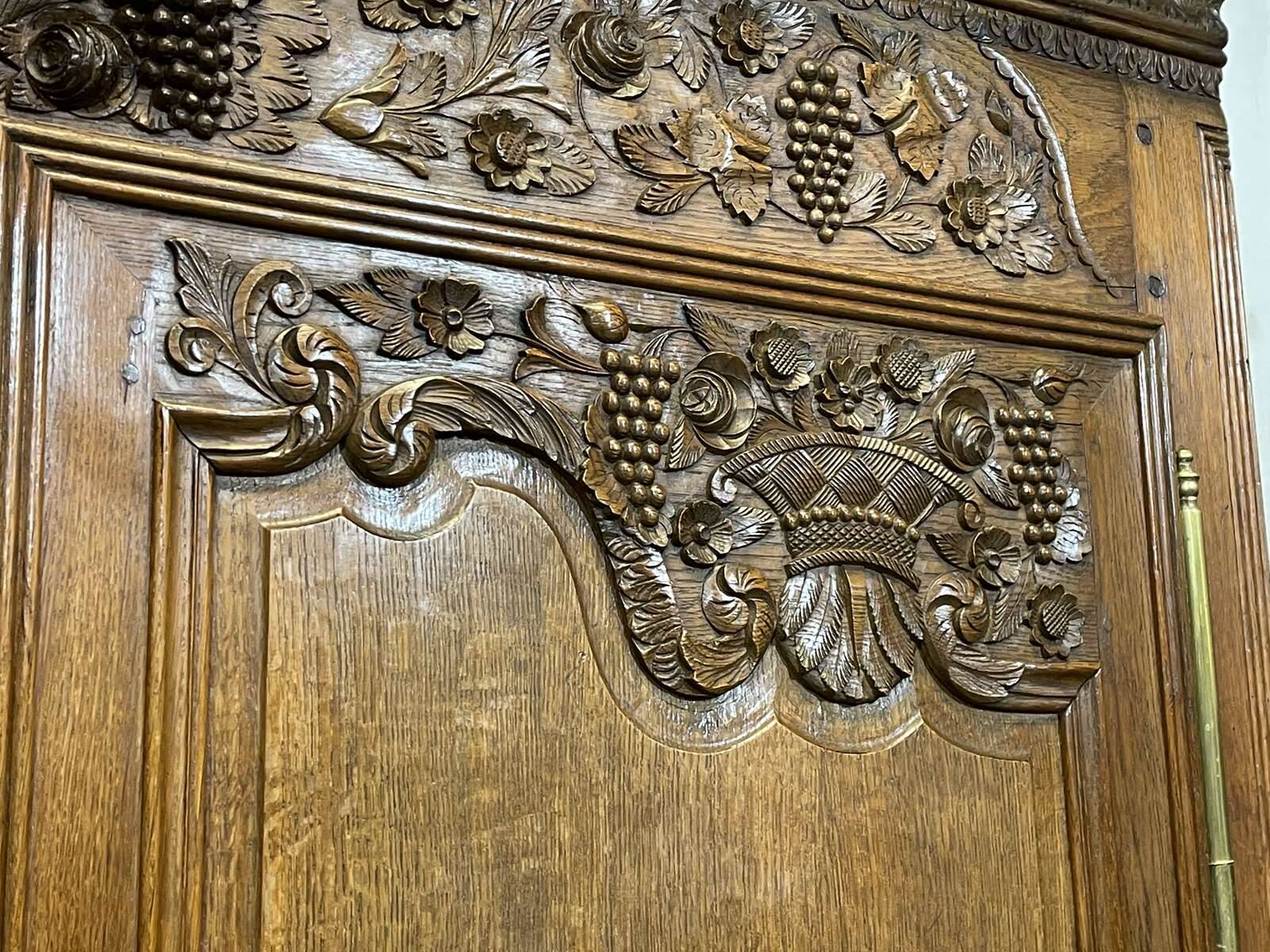 19th-century Norman wedding armoire in blonde oak.