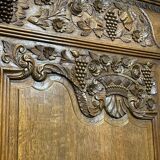 19th-century Norman wedding armoire in blonde oak.