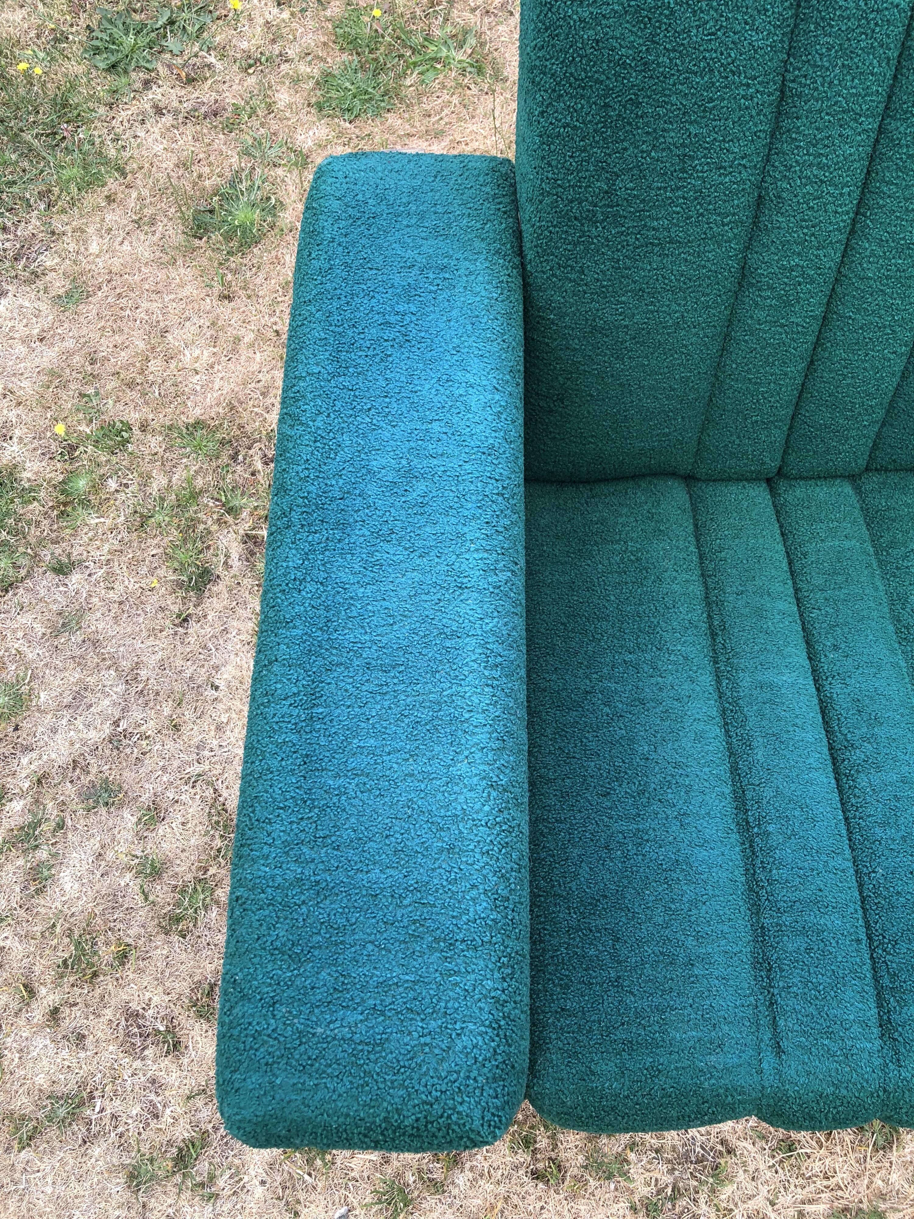 Duo of vintage armchairs with green fabrics.