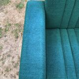 Duo of vintage armchairs with green fabrics.