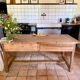 Renovated raw wood farmhouse table