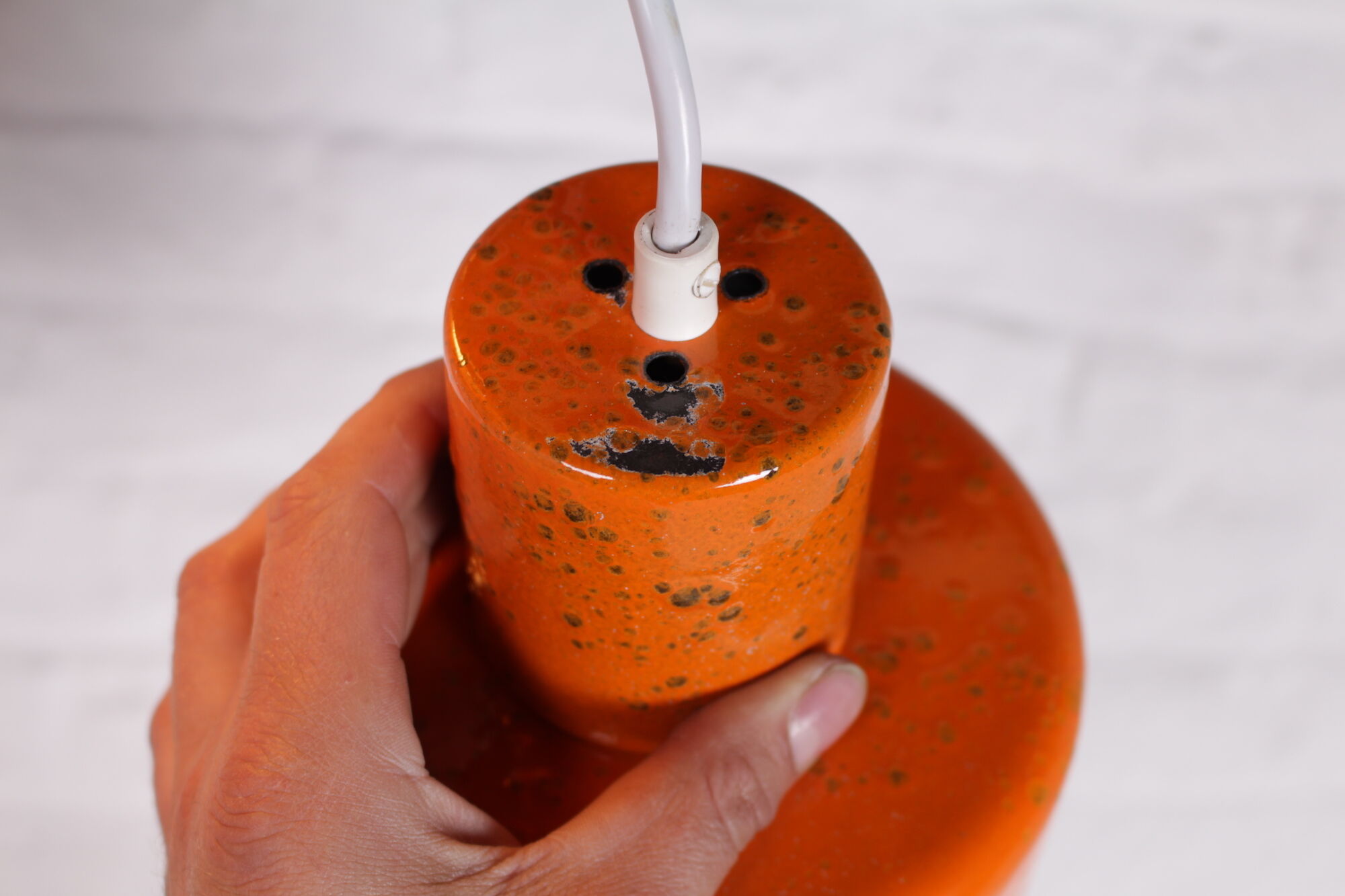 6 Orange enamelled metal suspensions, 1960s
