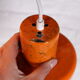 6 Orange enamelled metal suspensions, 1960s
