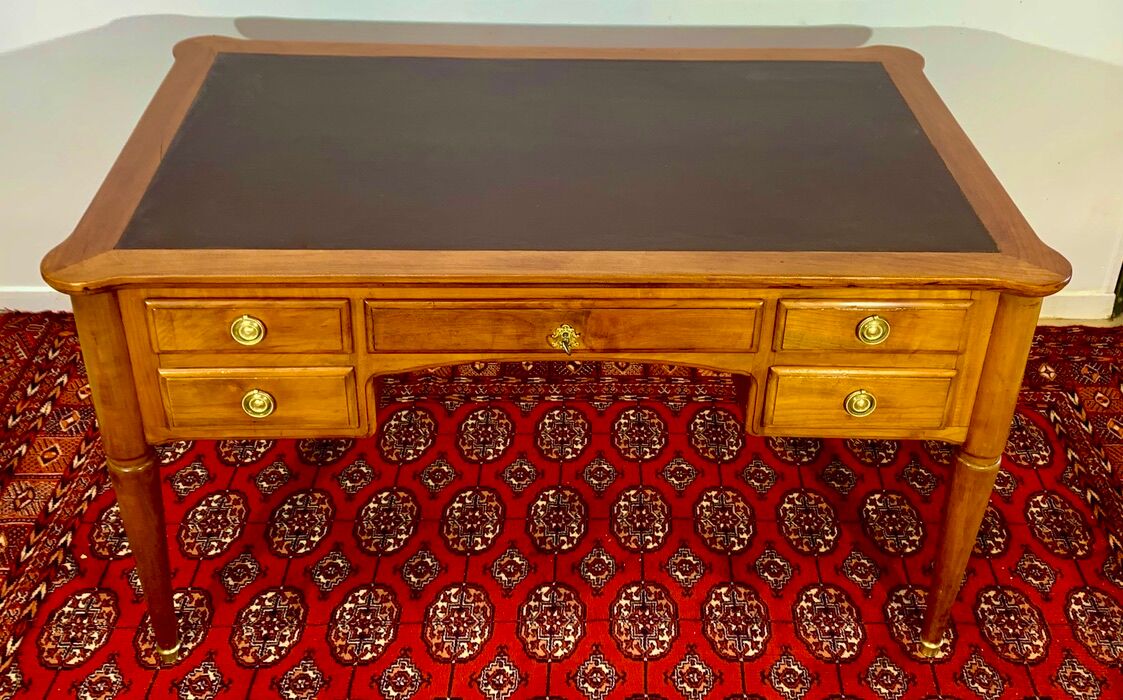 Louis XVI desk in cherry wood and gilded bronzes