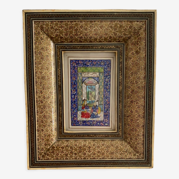 Oriental engraving with its gilded frame