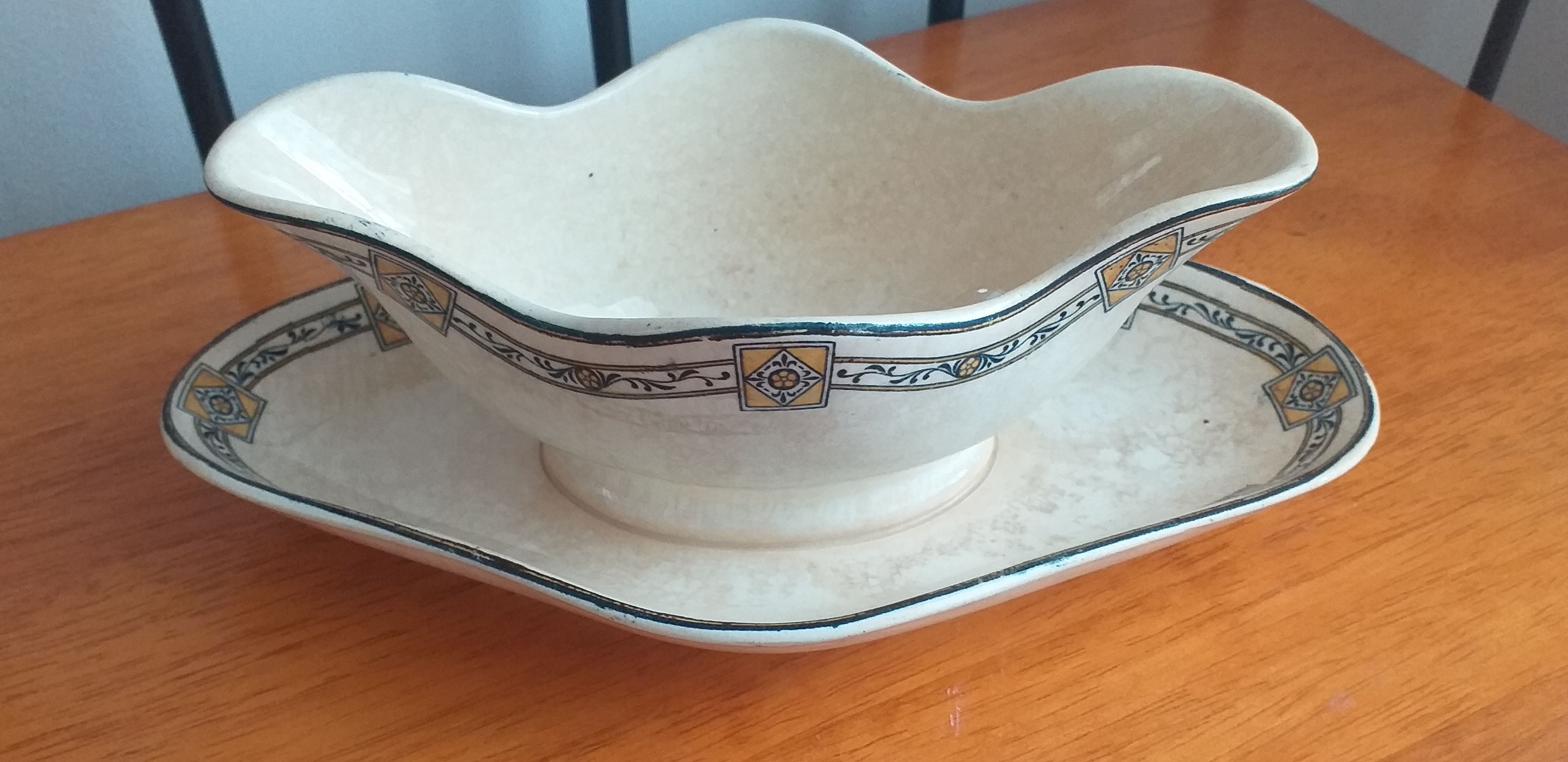 Together a sausage and a ravier porcelain Terre de Fer Salins E.Charbonnier model Royal