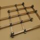 Expandable silver metal trivet