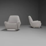 Pair of fabric and stainless steel lounge chairs by Gianni Moscatelli
