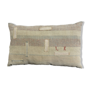 Coussin artisanal en toile ancienne