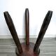Dark wooden tripod stool