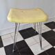 Vintage yellow leatherette stool from the 1950s