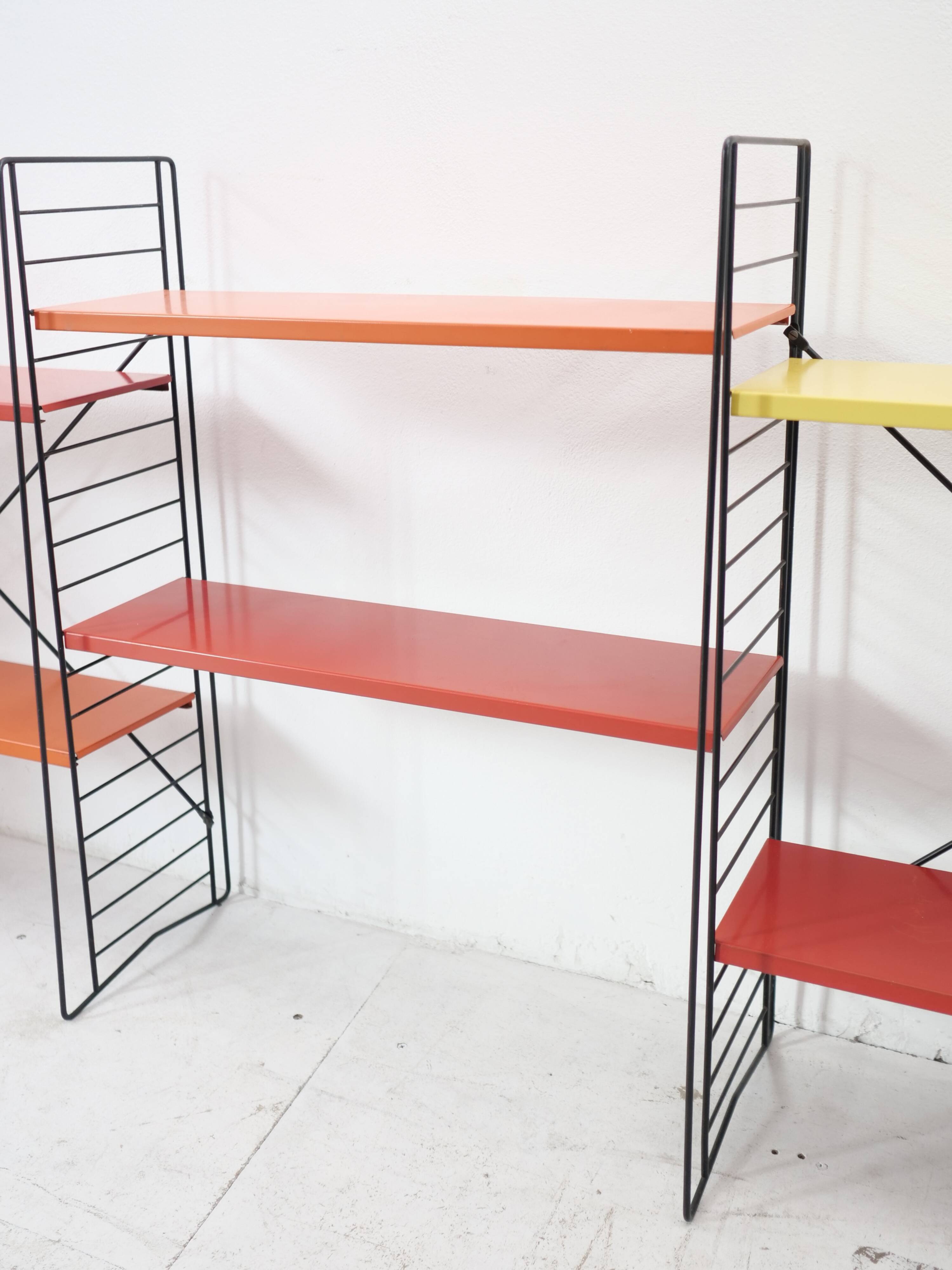 Tomado shelf in coloured metal floor shelves from 1958.