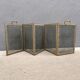 Antique fireplace screen in copper and brass from the 19th century.