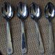 Lot 4 spoons metal decorations
