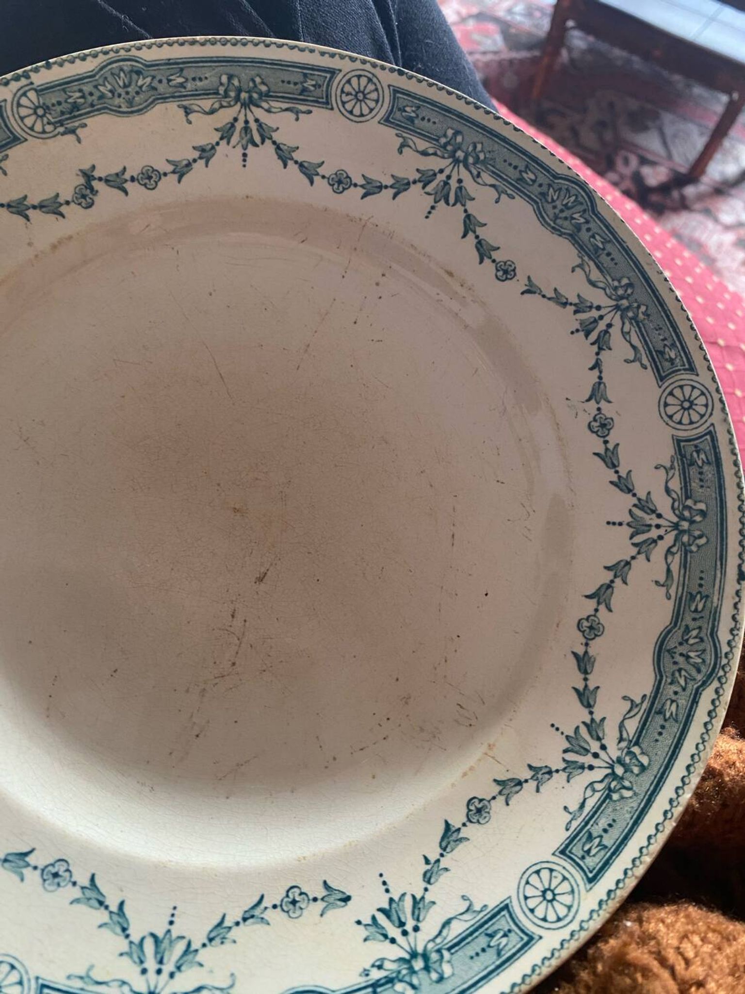 3 flat plates in ironstone with a green floral border