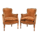 Paire de fauteuils bergère de style Louis XV