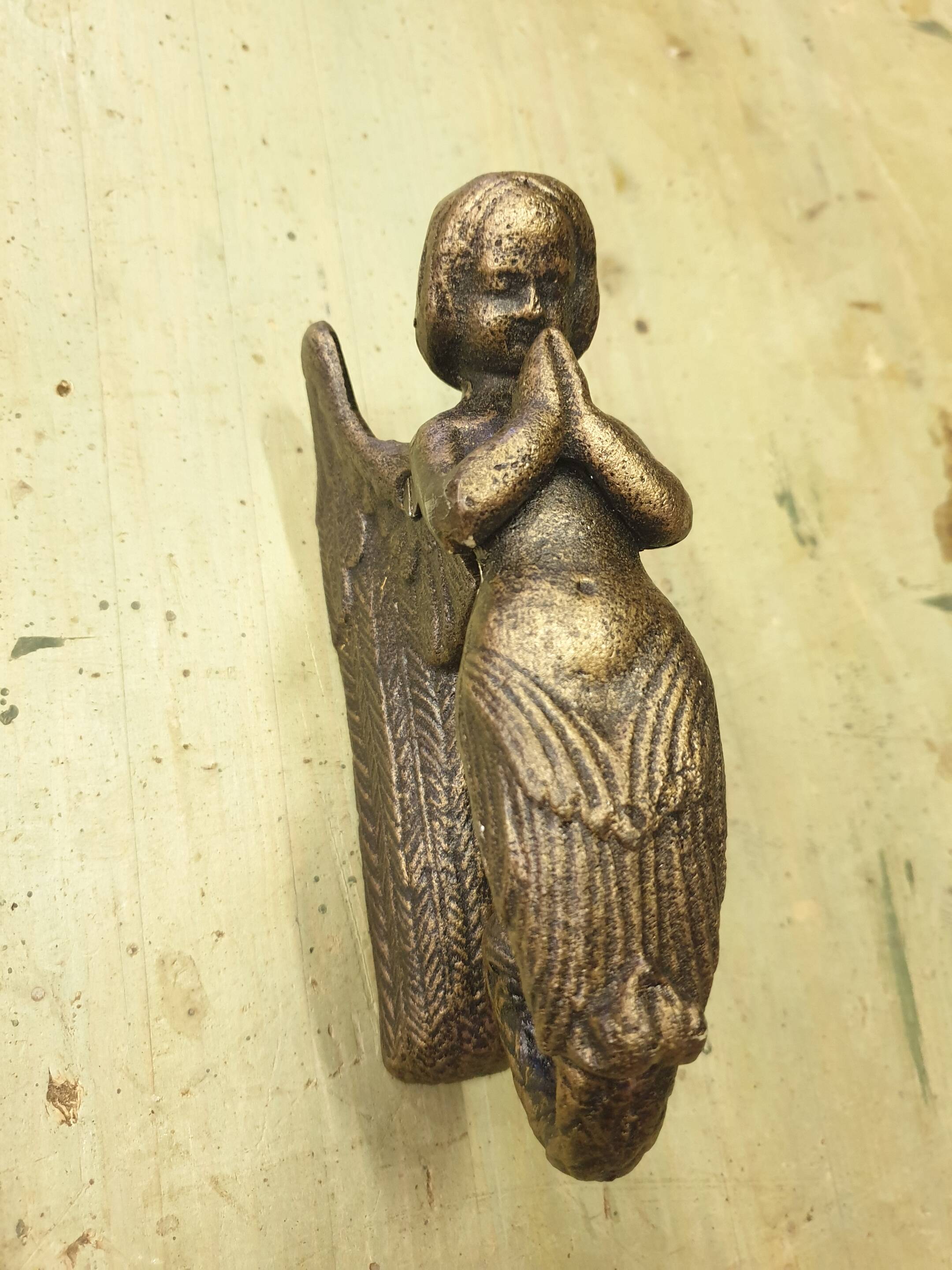 Small bronze-colored cast iron mermaid or cherub door knocker - 20th century