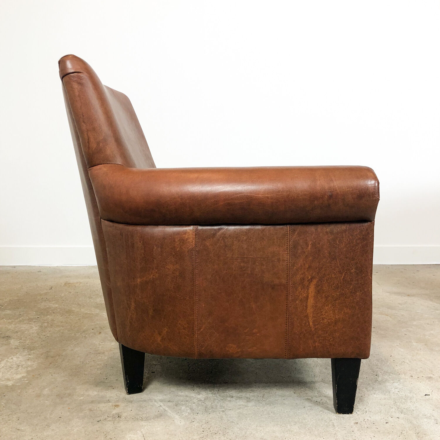 Set of two vintage leather armchairs