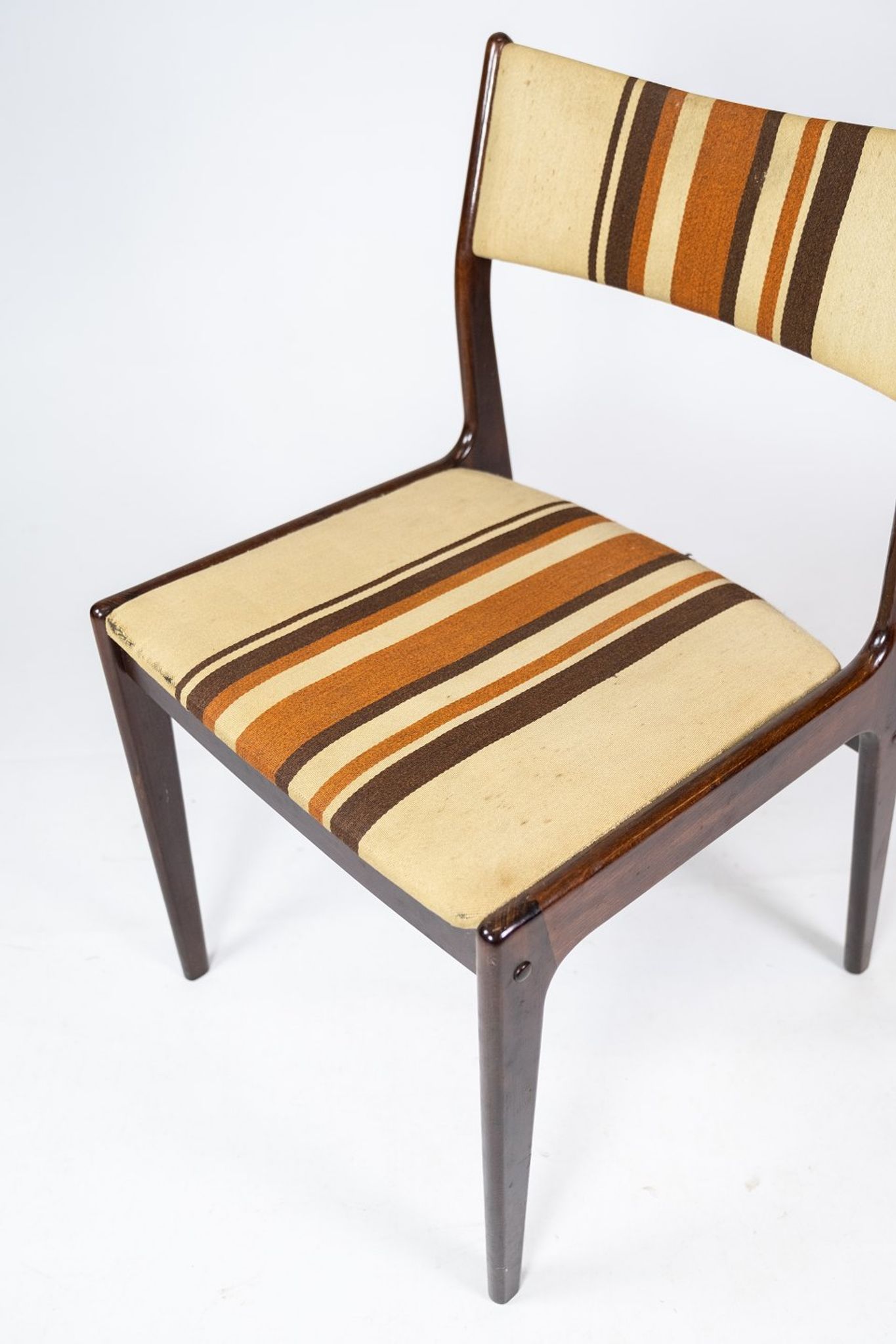 Pair of chairs in dark wood upholstered with light striped fabric of danish design