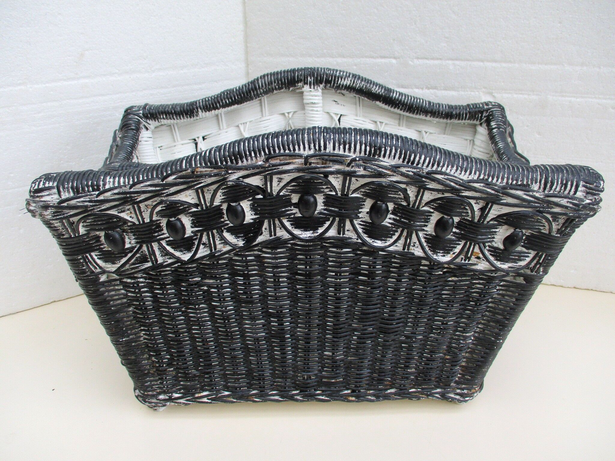 Black and white rattan magazine door