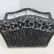 Black and white rattan magazine door