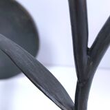 Pair of flower-shaped candlesticks in black metal and copper