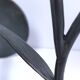 Pair of flower-shaped candlesticks in black metal and copper