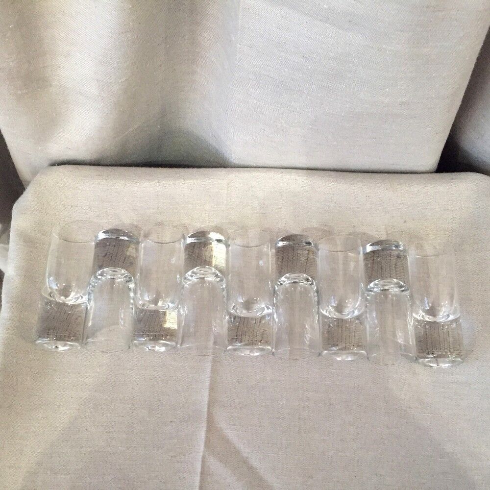 Suite of 9 glass liquor shot glasses