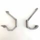 Two mismatched art deco aluminum hooks