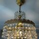 Chandelier with crystal and brass pendants