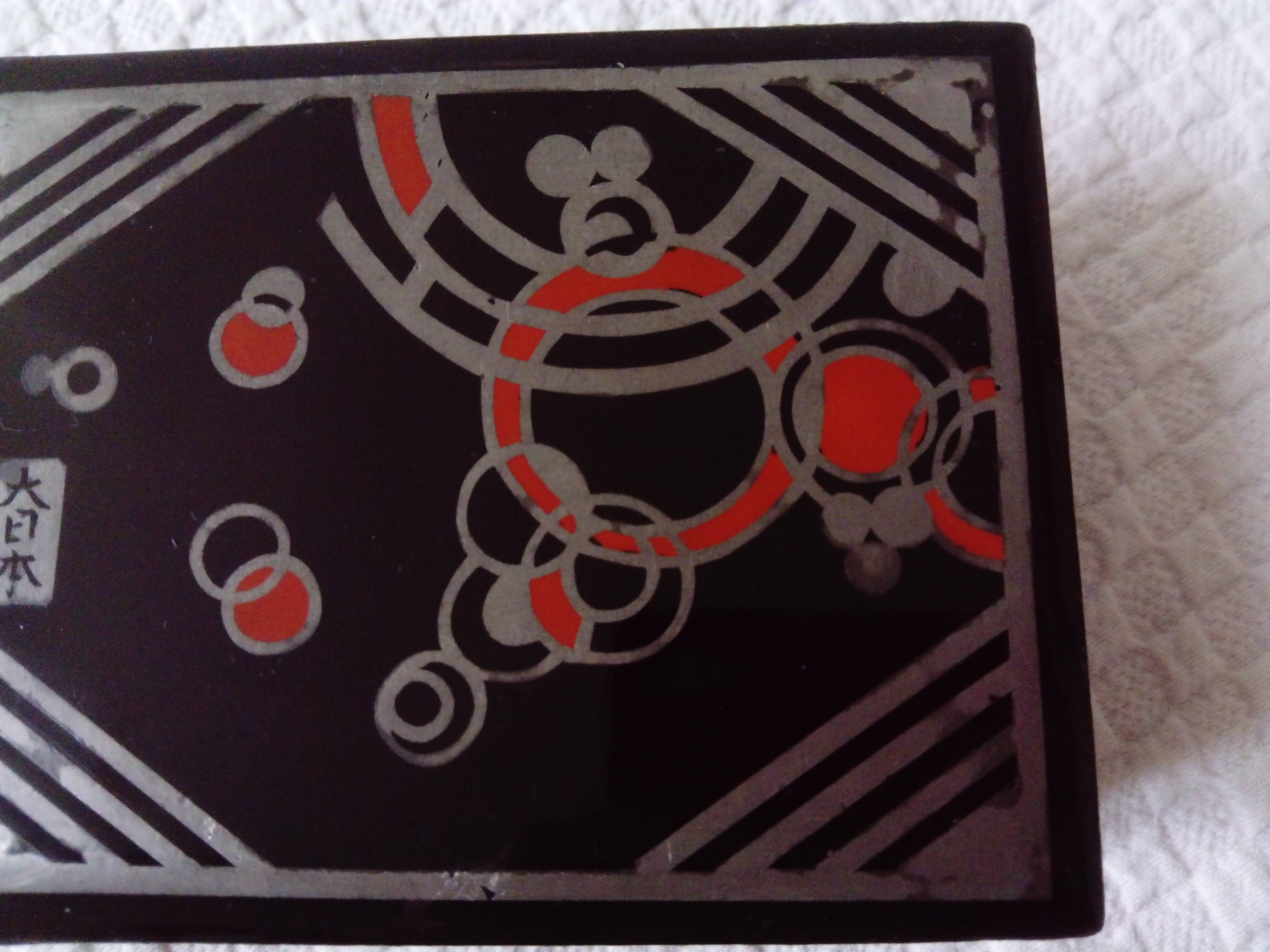 Small black lacquered box with Art Deco decor.Japan