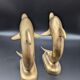 Pair of brass dolphins bookends