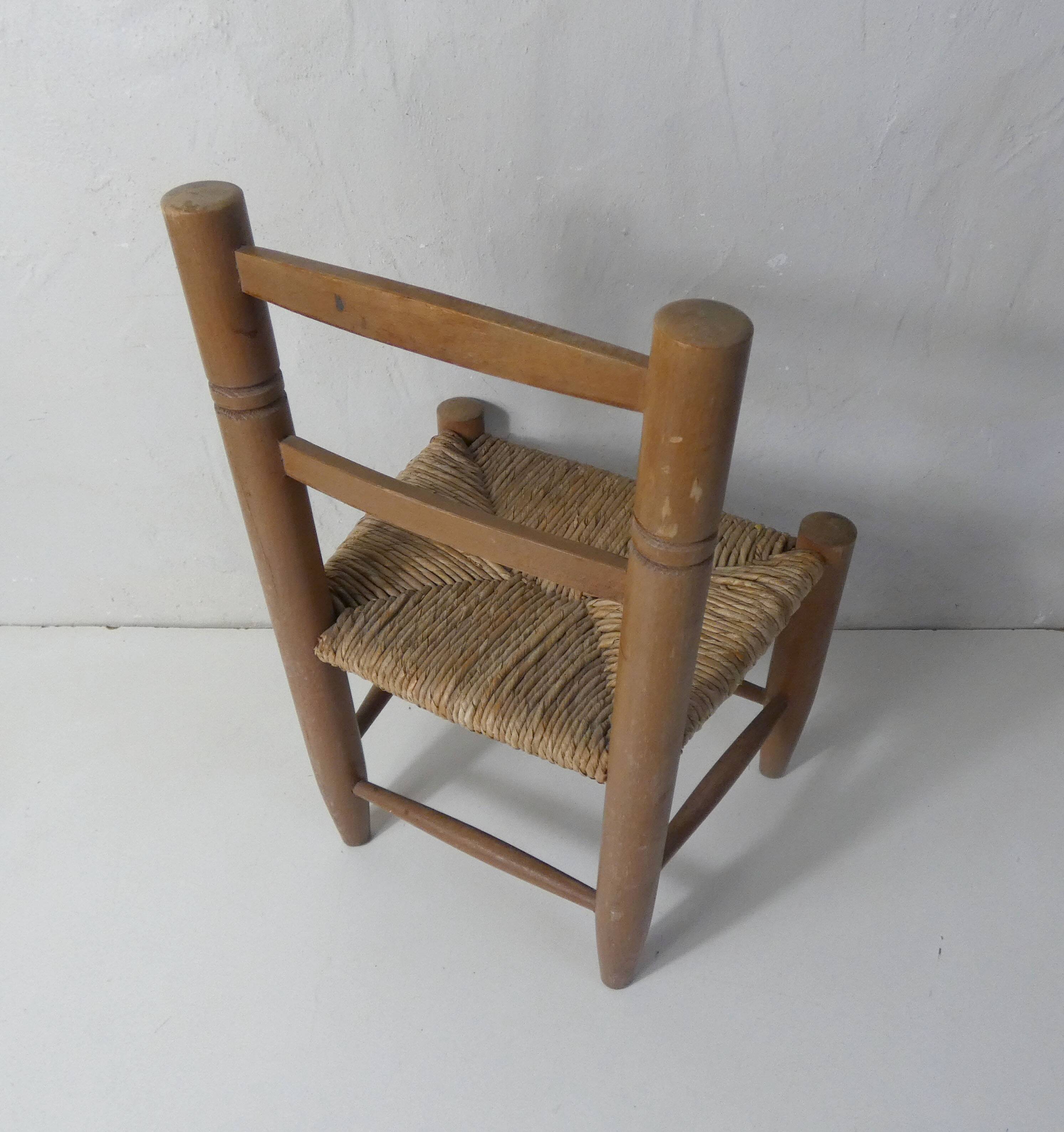 Old wooden straw chair for children