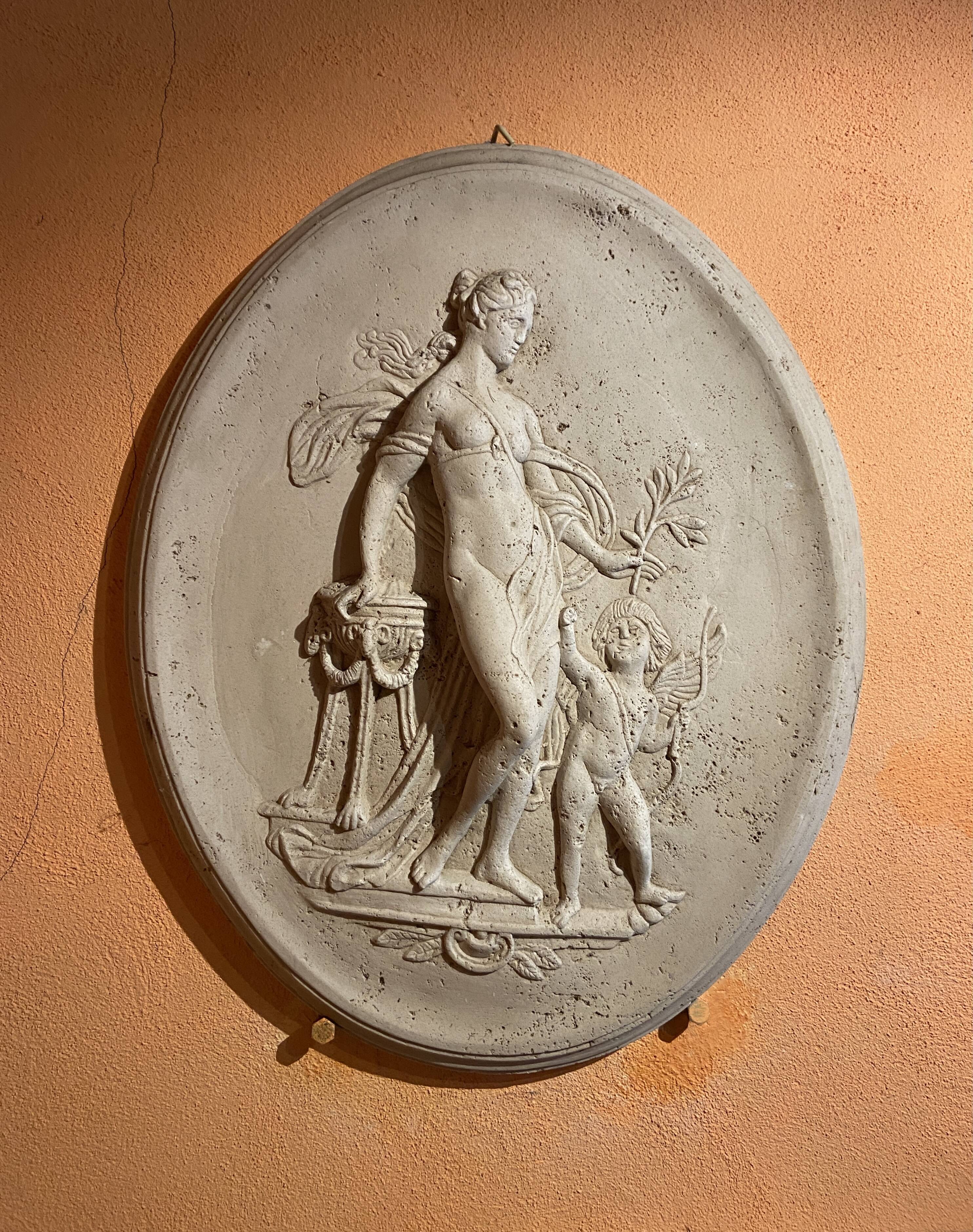 Imposing Oval bas-relief style Antique Italian travertine