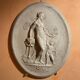 Imposing Oval bas-relief style Antique Italian travertine