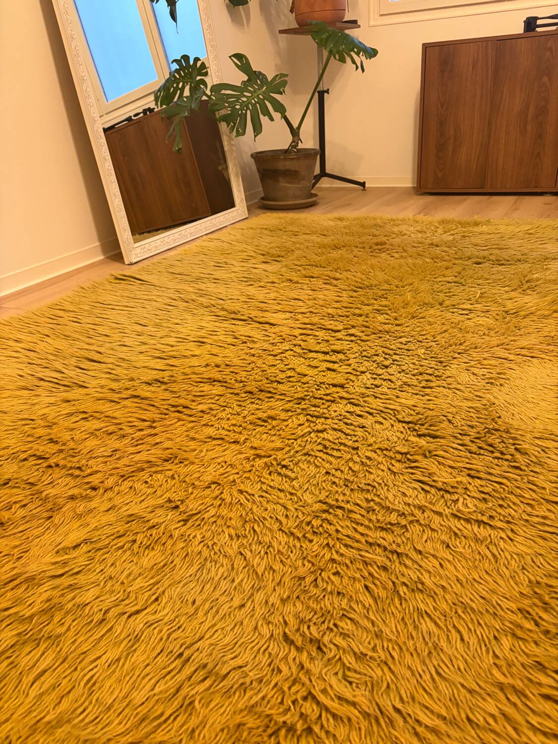Large handmade wool rug from the 70s in lime green.