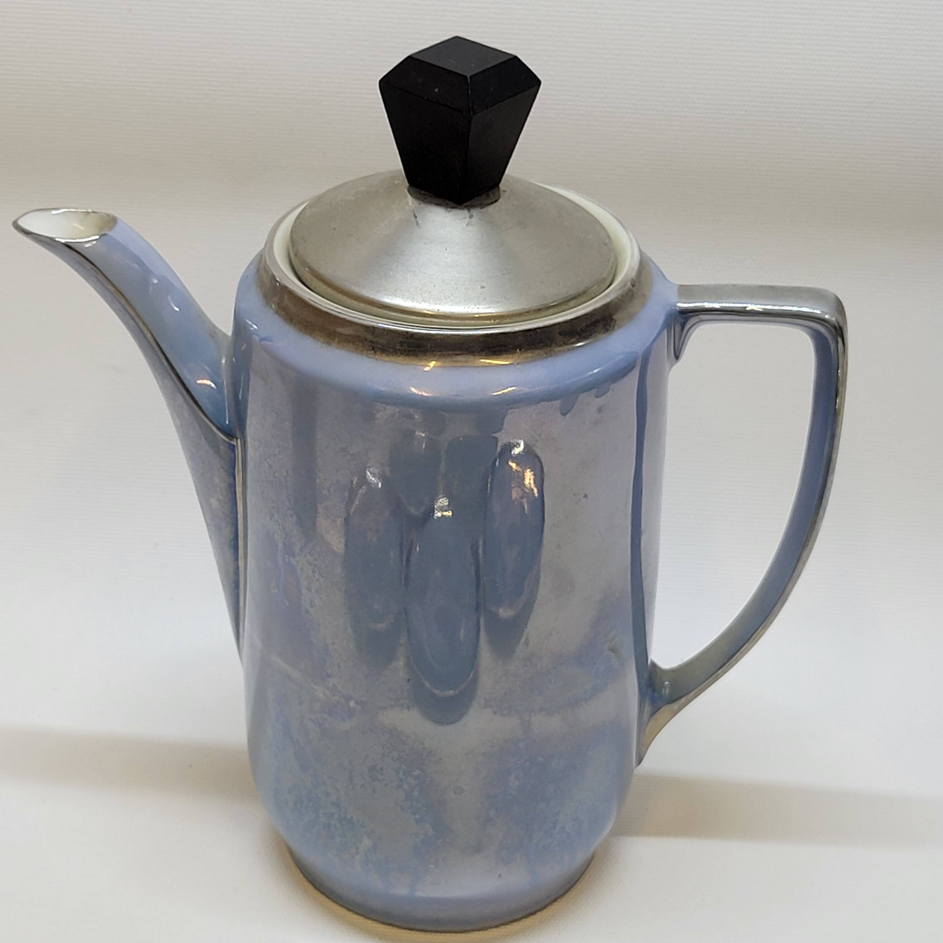 Art deco coffee service in fine iridescent blue porcelain, metal and wood