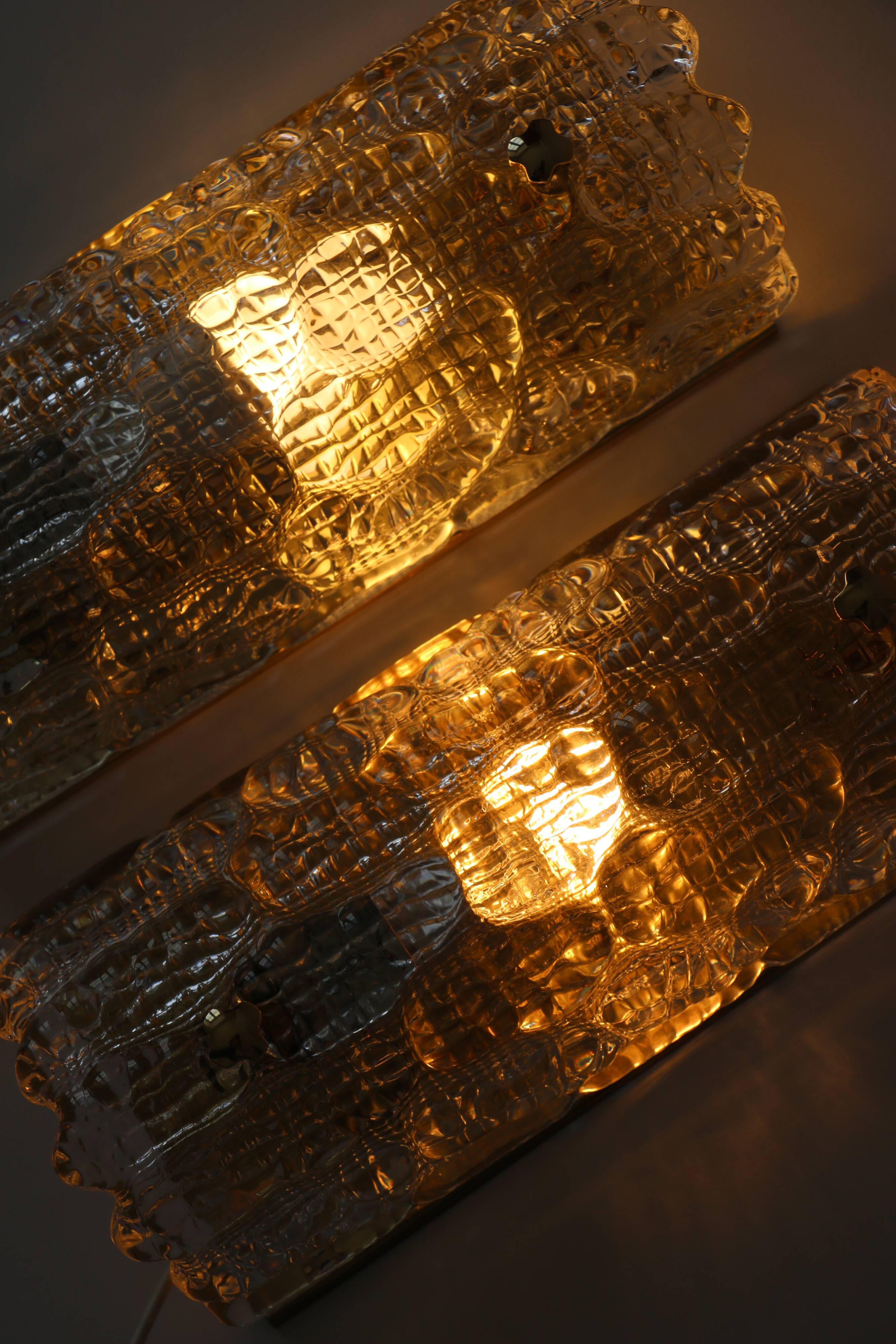 Pair of glass and brass wall lights by Carl Fagerlund for Orrefors.