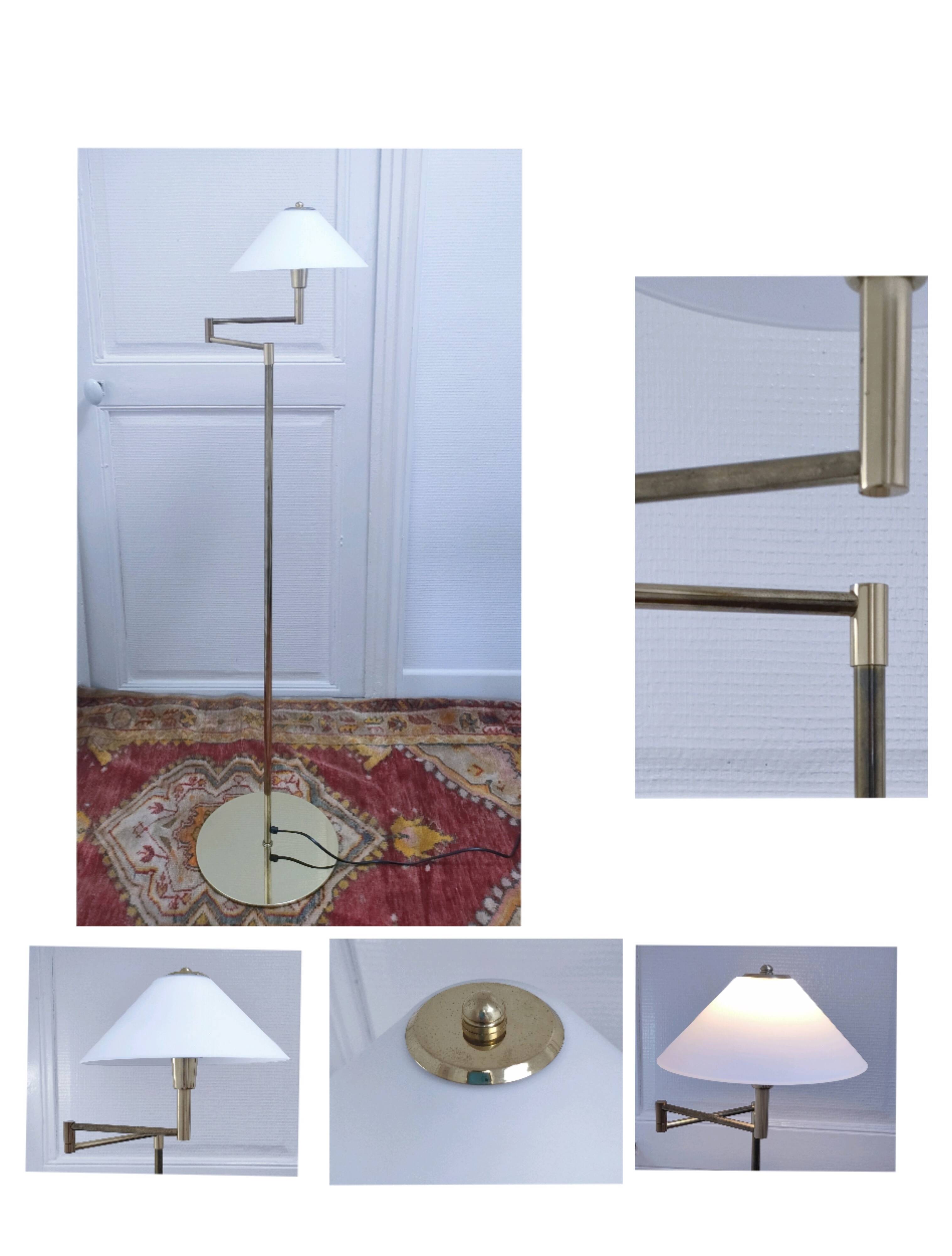 Articulated reading floor lamp in gold metal from the 90s