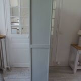 Vintage shallow bookcase re-enchanted in verdigris.