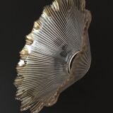 Transparent, slightly amber glass tulip. Vertical streaks.